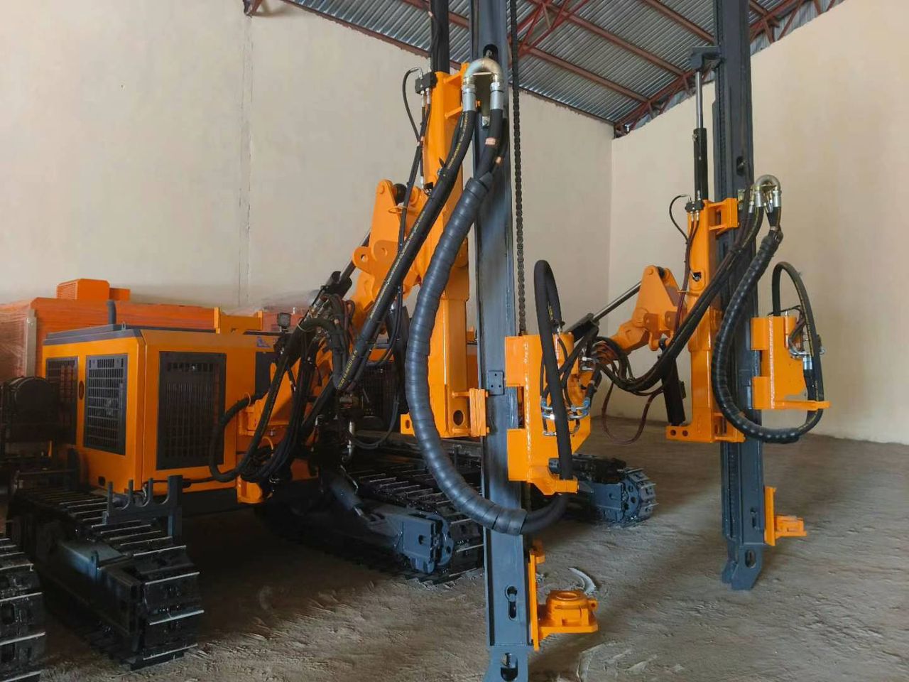 Crawler drilling rigs in warehouse
